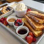 Family-style Brioche French Toast serving