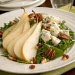 Served roquefort pear salad on plate