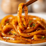 Korean Potato Noodles Recipe – Easy Non-Spicy Tteokbokki at Home 6 Dishfeast serving korean potato noodles