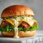 Spicy Crispy Chicken Burger - Chicken Sandwich Recipe 9 Spicy crispy chicken burger with melted cheese and creamy sauce